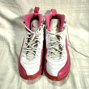 Pink and white Jordan retro 12